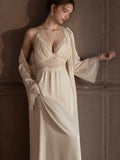Detail of the bell sleeves with lace cuffs on the robe.