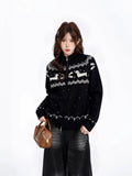 Woman wearing black Fair Isle knit zip cardigan with dachshund motifs