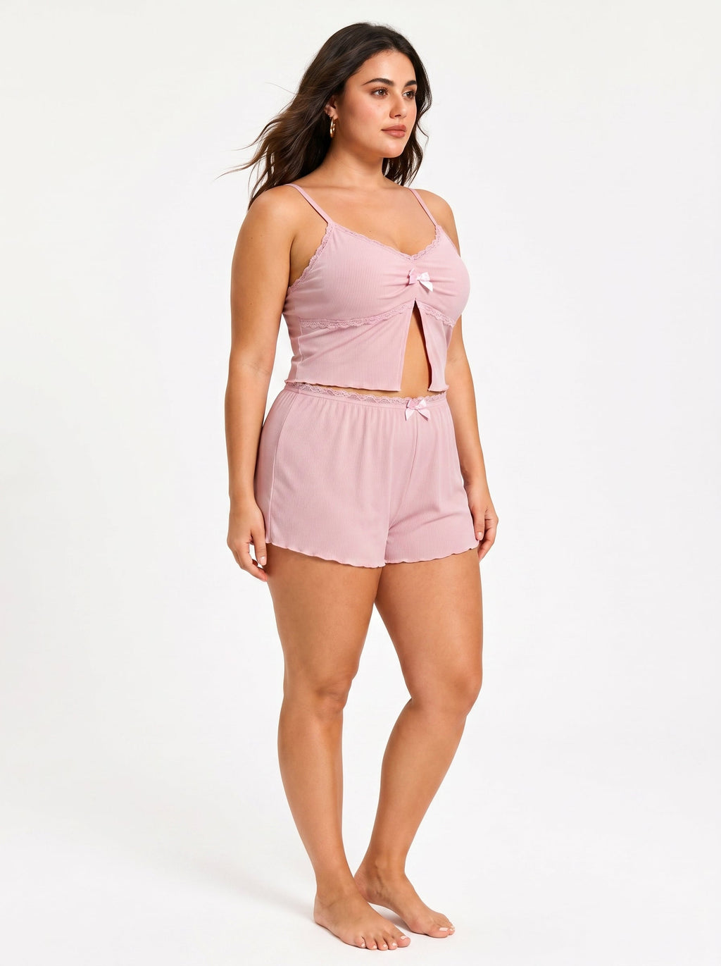 Side profile of a woman in a pink ribbed knit loungewear set