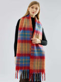 Full body shot of a woman in a plaid scarf