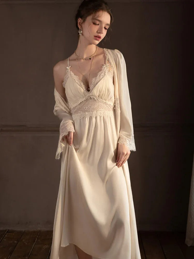 Close-up of the lace detailing on the V-neck slip dress.