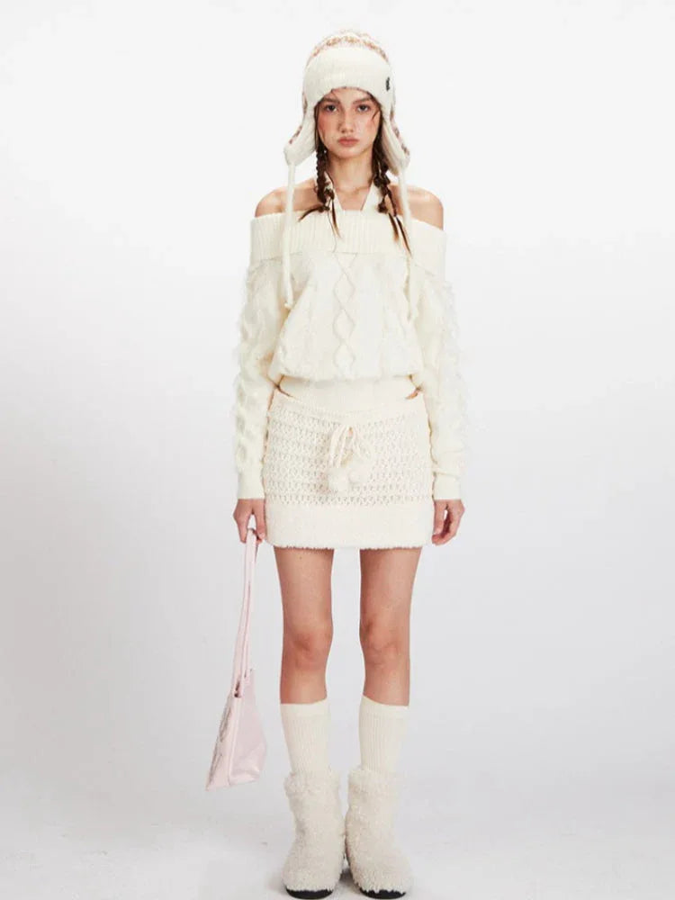 Cream cable knit cropped sweater with button front and off-the-shoulder neckline