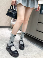Grey knee-high socks with black satin bows and white pearl embellishments - View 8 | WEUXS