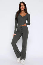 Side view of women's cream long sleeve pajama set