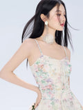 Close-up of the floral print and ruched bodice of a mini dress