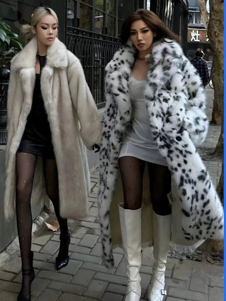 two women walking on a sidewalk, one wearing a long faux fur coat with a black and white animal print