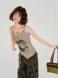 Woman posing with a taupe ribbed knit graphic print tank top
