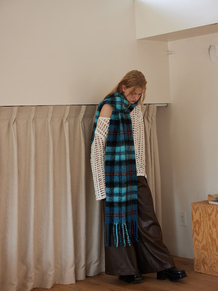 Fuzzy knit plaid scarf with fringes