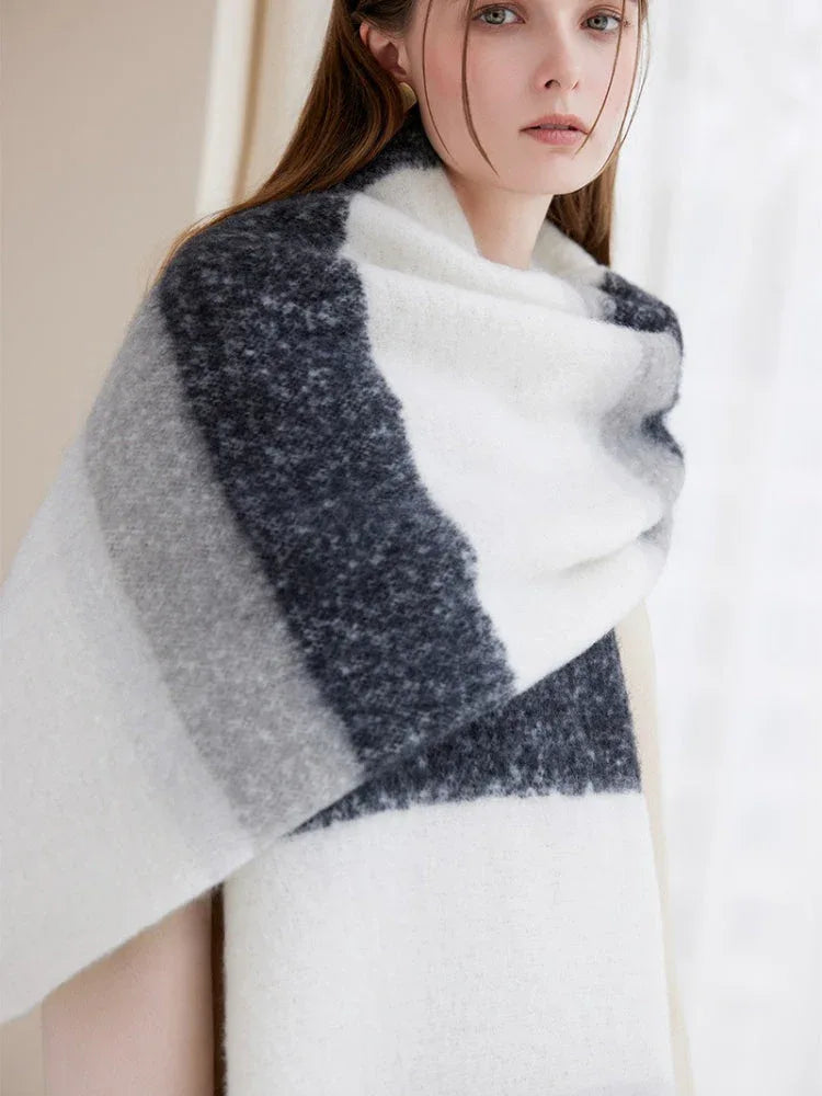Detail shot of a winter scarf with prominent horizontal stripes and soft texture