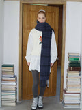 detailed view of a textured wool blend tartan scarf
