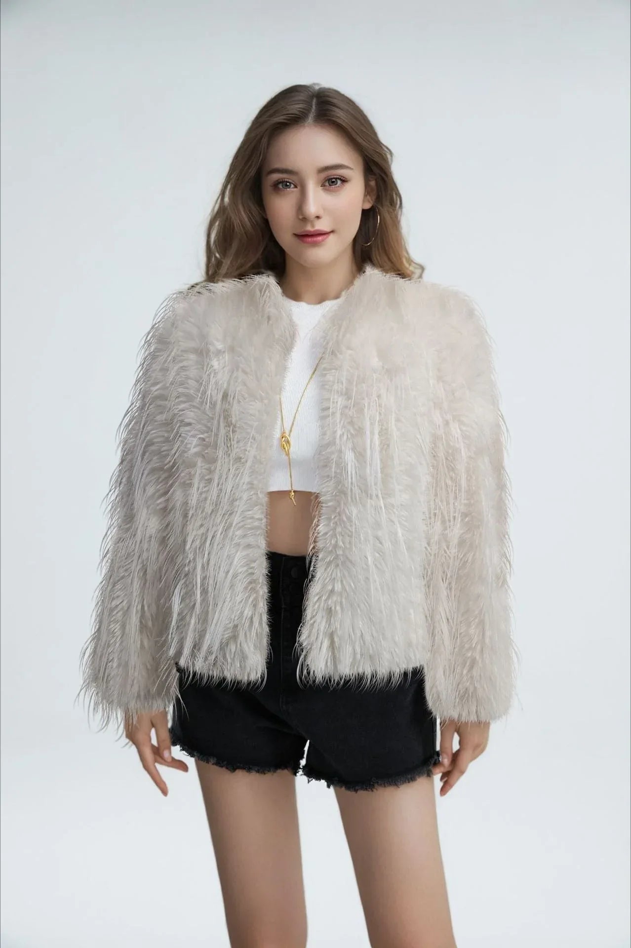 Woman wearing a light grey shaggy faux feather cropped jacket Main image