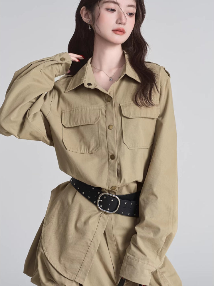 Close-up of the khaki camp collar shirt dress featuring button-down closure and chest pockets.