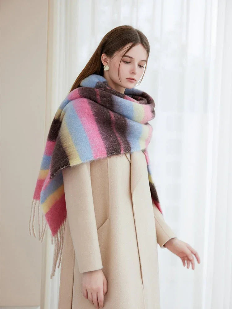 fashionable woman styled with a large colorful striped scarf