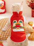 Back view of a white cat in a red pet vest with Lion Dance embroidery