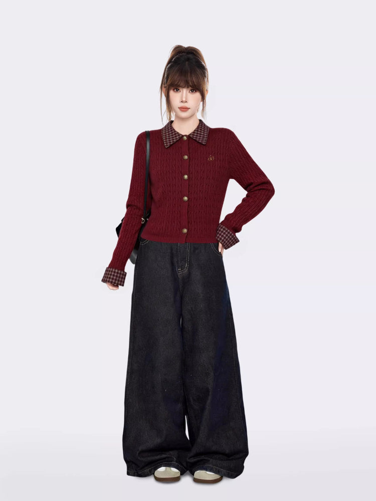 Woman posing in a burgundy cable knit cardigan, showcasing the plaid accents and fitted silhouette.