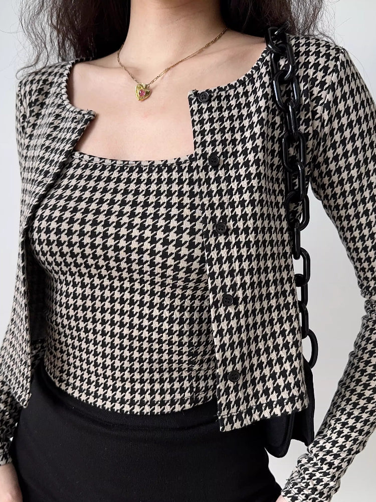 Front view of a woman in a houndstooth print cropped cardigan and camisole set.