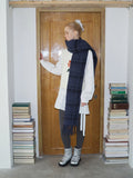woman wearing black and grey plaid wool blend scarf - View 7 | WEUXS