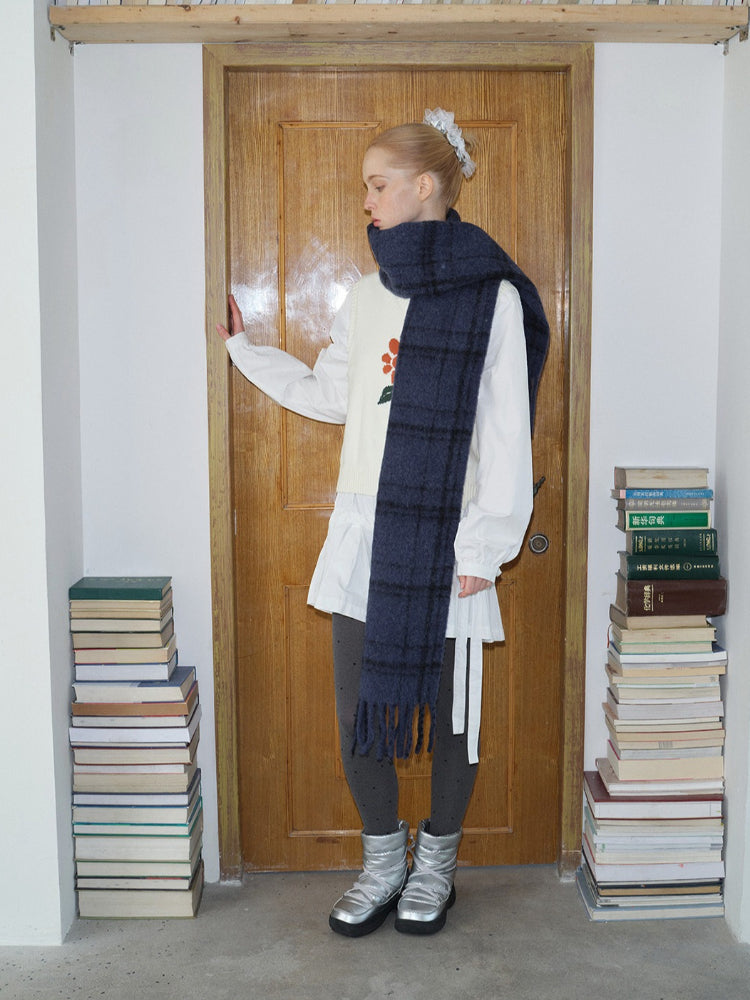 woman wearing black and grey plaid wool blend scarf - View 7 | WEUXS