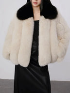 Close-up of contrast collar on faux fur jacket