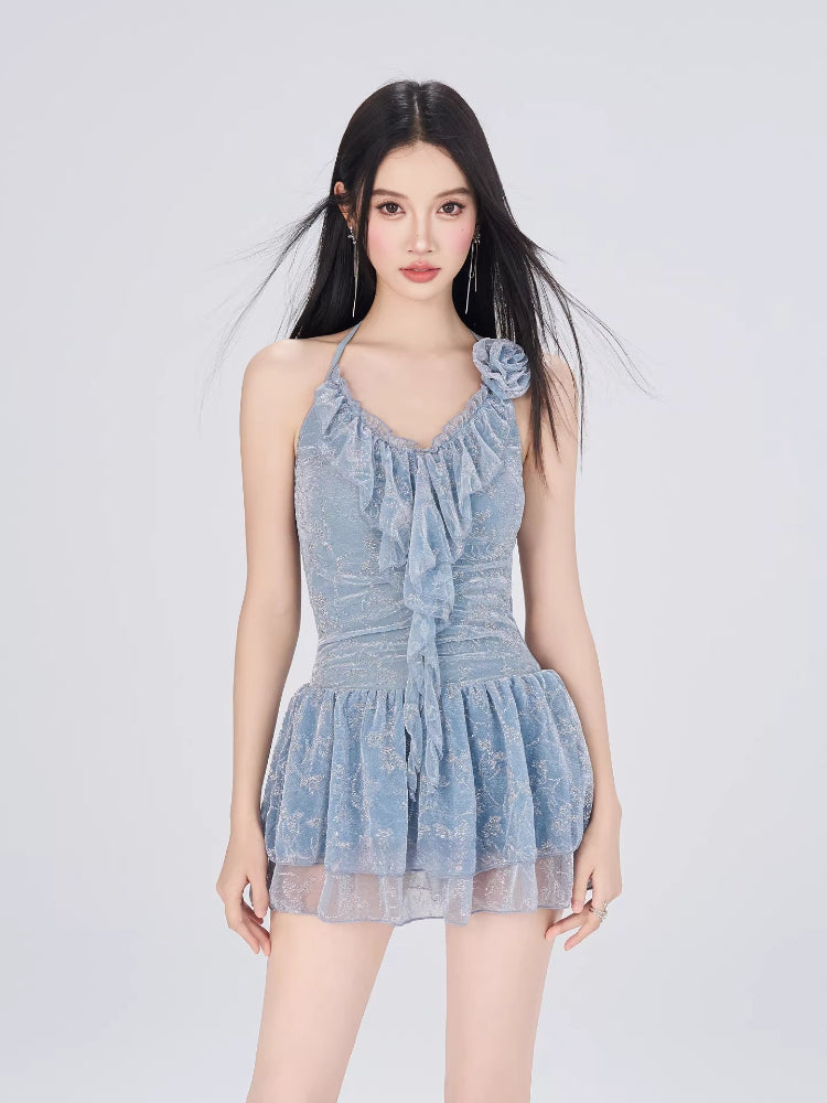 Front view of the light blue textured lace halter dress with a cinched waist