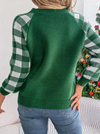 Woman wearing a white and red festive reindeer knit sweater with buffalo plaid raglan sleeves. - View 13 | WEUXS
