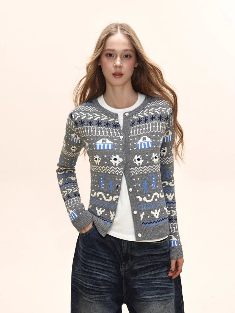 Woman wearing a grey button-down cardigan with a Fair Isle knit pattern and white t-shirt.