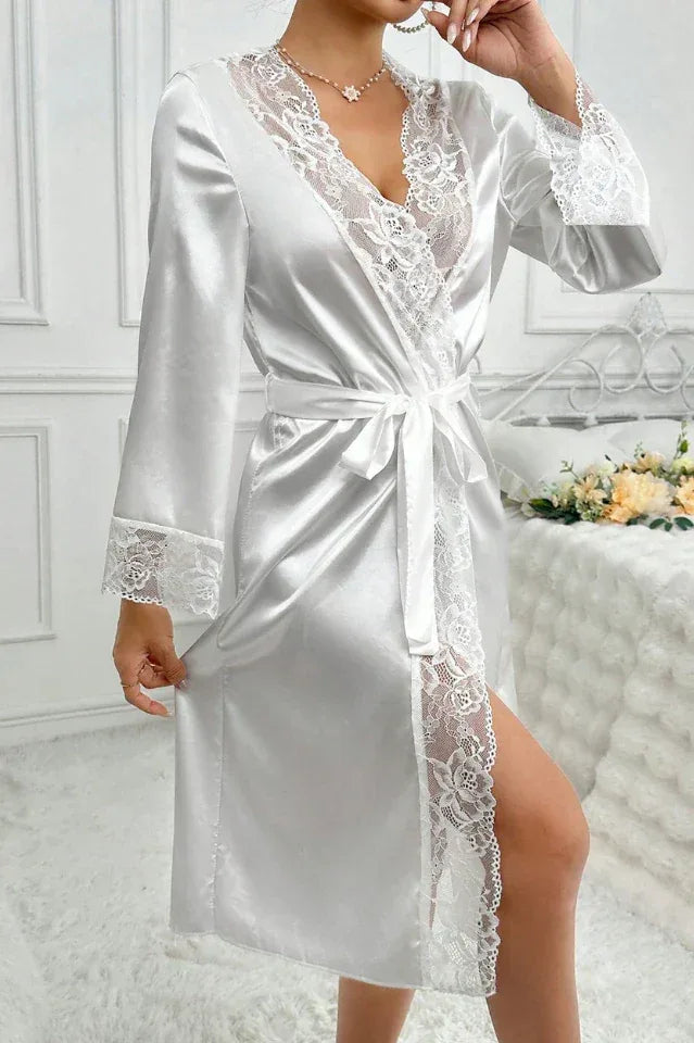 Woman posing in a white satin robe