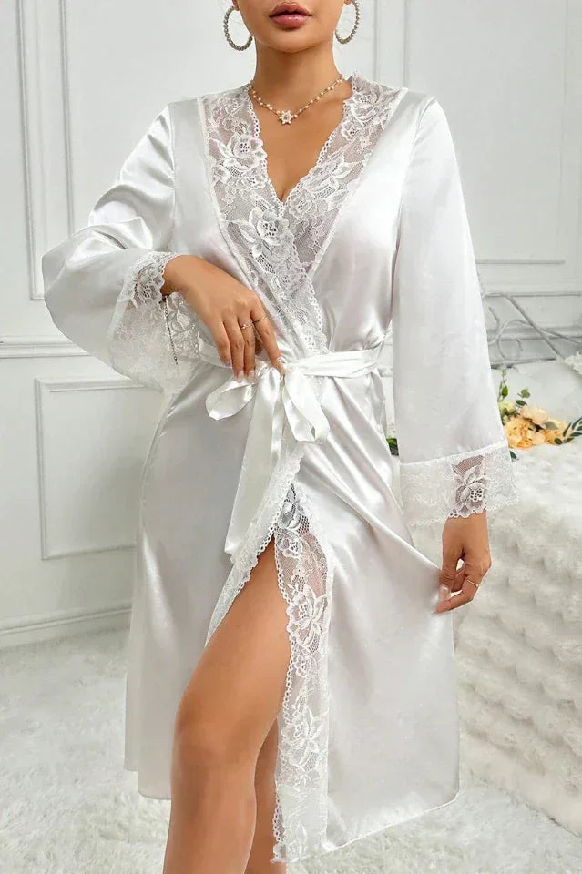 Back view of a woman in a white satin robe