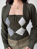 Close-up of the argyle print knit tube top with a tie front.