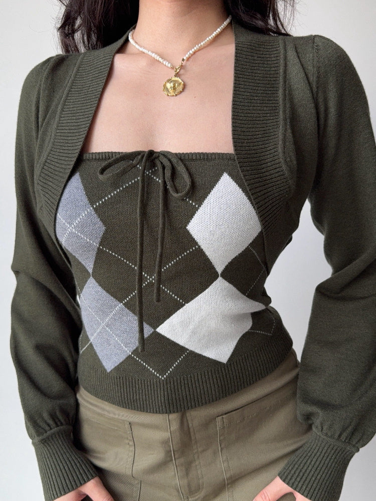 Close-up of the argyle print knit tube top with a tie front.