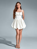 Full length shot of white square neck dress