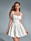 Front detail of white ruched bodice dress