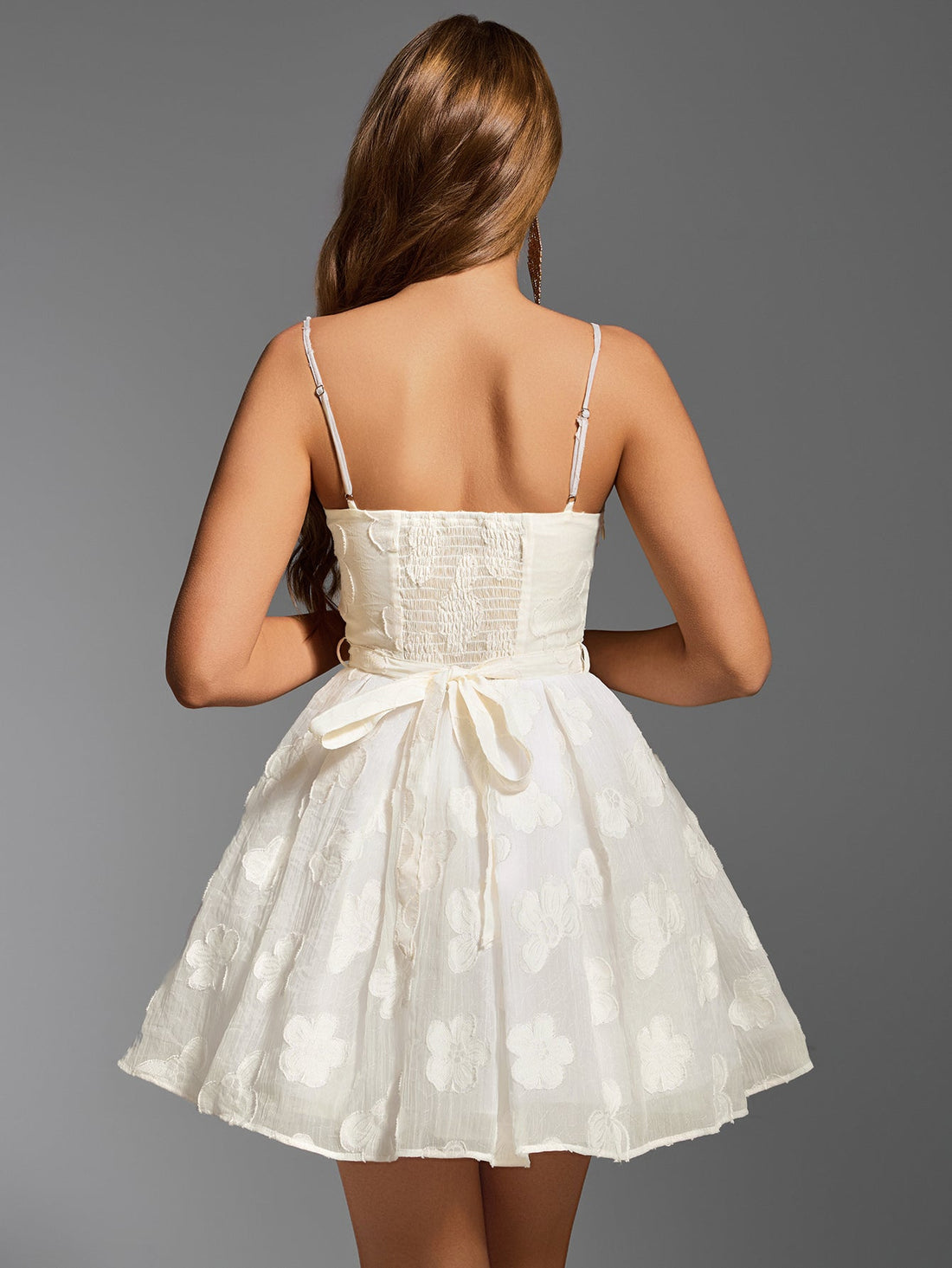 White embroidered floral sweetheart neckline spaghetti strap fit and flare dress front view