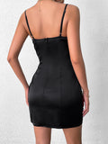 back view of black satin mini dress