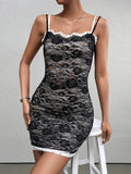 Woman wearing a black lace sheath dress with white trim and spaghetti straps.