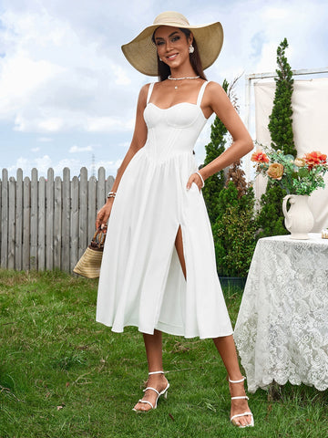 woman in white linen blend dress with corset bodice and high slit