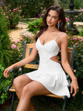 Woman in white cut-out tiered dress sitting on a bench in a garden