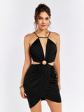 Full body shot of a woman in a black halter neck mini dress with a ring accent and ruched detailing.