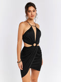 Front detail of a black halter neck mini dress with a ring detail at the waist and a plunging neckline.