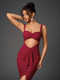 Close-up of a woman in a deep red, sparkly evening dress with a sweetheart neckline and a prominent midriff cutout, showcasing the ruched bodice detail.