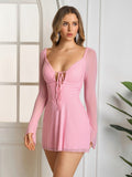 Front detail of a pink lace up mesh mini dress showing the neckline and tie front