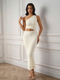 Beige lace maxi dress with asymmetric neckline and waist cutout