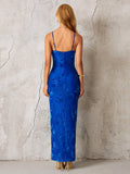 Back view of a blue floral maxi dress with spaghetti straps