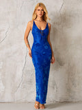 Close-up of the floral pattern on a blue maxi dress