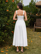 Back view of white ruched corset midi dress