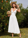 Model wearing white ruched corset midi dress with a hat