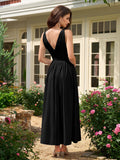 Back view of a black sleeveless midi dress with a deep V-neckline.