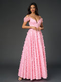 Elegant pink floral applique gown with a flared hem
