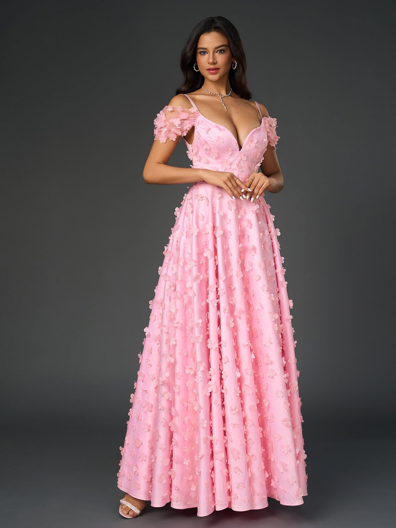 Elegant pink floral applique gown with a flared hem