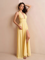 Elegant yellow halter neck gown for formal occasions